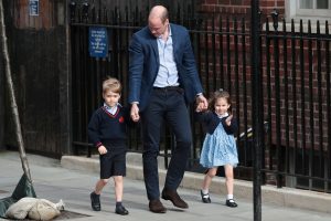 A sweet video of Prince George and Princess Charlotte helping Prince William is going viral