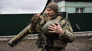 Surrendered Russian soldier given tea and pastries by Ukranian civillians